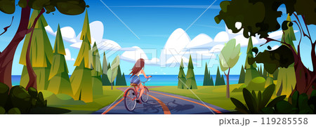 Woman on bike in forest road near sea nature view 119285558