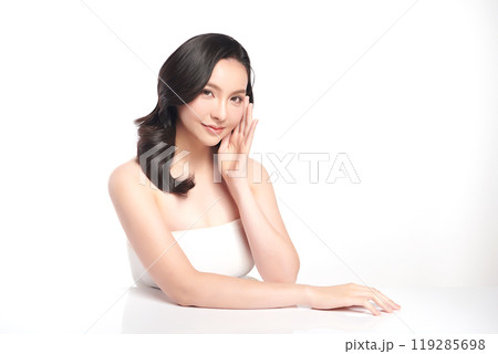 Beautiful young asian woman with clean fresh skin on white background, Face care, Facial treatment, Cosmetology, beauty and spa, Asian women portrait. Beautiful young asian woman with clean fresh skin on white background, Face care, Facial treatment, Cosmetology, beauty and spa, Asian women portrait. 119285698