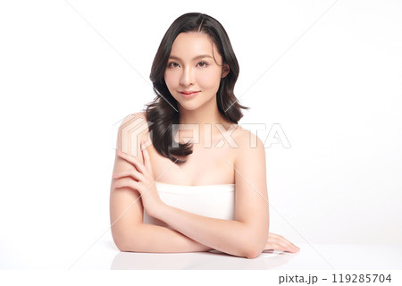 Beautiful young asian woman with clean fresh skin on white background, Face care, Facial treatment, Cosmetology, beauty and spa, Asian women portrait. Beautiful young asian woman with clean fresh skin on white background, Face care, Facial treatment, Cosmetology, beauty and spa, Asian women portrait. 119285704
