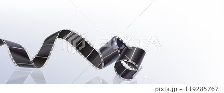 Cinema film strip. Camera roll tape background Cinema film strip. Camera roll tape background 119285767