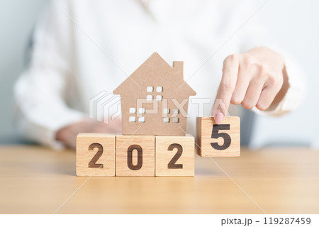 Happy New Year 2025 with house model. real estate, Home loan and mortgage, tax, investment, financial, savings and New Year Resolution concepts Happy New Year 2025 with house model. real estate, Home loan and mortgage, tax, investment, financial, savings and New Year Resolution concepts 119287459