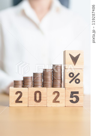 2025 New year with percentage change to UP and Down arrow with coin stack. Interest rate, GDP, stocks market, financial, deflation and Inflation, mortgage, debt, Loan and Economic Recession 119287486