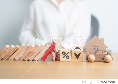 wood block falling on percentage change to UP and Down arrow with Home and Car model. Real estate Mortgage, House loan and Car debt, Interest rate, Insurance and economic recession 119287596