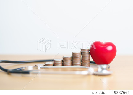 Money Saving, Health Insurance, Medical, Donation and Financial concepts. coins stack with doctor stethoscope and Heart, Money stack Counting arrangement for deposit and Healthcare cost Money Saving, Health Insurance, Medical, Donation and Financial concepts. coins stack with doctor stethoscope and Heart, Money stack Counting arrangement for deposit and Healthcare cost 119287666