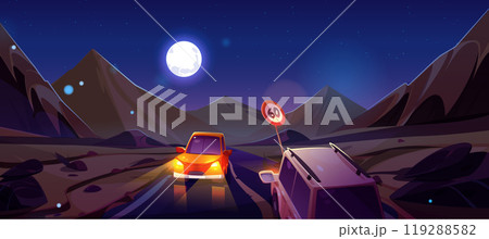 Cars driving night mountain desert road 119288582