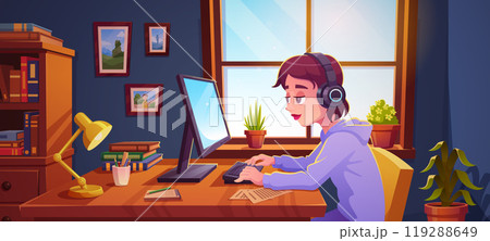 Teenager working on desktop computer at home 119288649