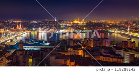 Aerial panoramic night view of Golden Horn inlet and illuminated streets of Istanbul, Turkey. 119289142