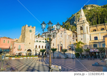Square Piazza IX Aprile with San Giuseppe church and Clock Tower in Taormina, Sicily, Italy. Square Piazza IX Aprile with San Giuseppe church and Clock Tower in Taormina, Sicily, Italy. 119289145