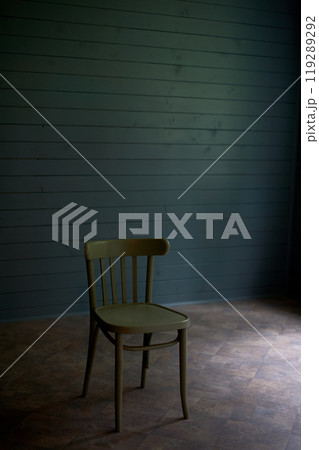 Wooden chair in an empty room, loneliness and minimalism. Room d cor. 119289292