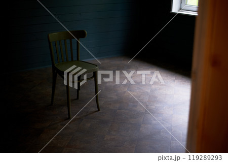 Wooden chair in an empty room, loneliness and minimalism. Room d cor. 119289293