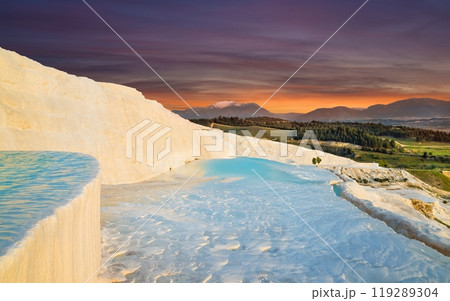 Sunset view of amazing Pamukkale. Travertine terrace formations with flowing thermal springs in Pamukkale most visited attraction in Turkey. 119289304
