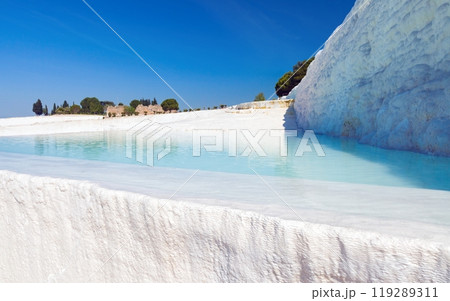 Pool with clear hot water from thermal spring in Pamukkale, Turkey. Pamukkale is most visited turkish travel attraction. 119289311