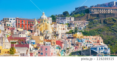 Colorful vibrant houses on Marina Corricella in sunny day in Procida Island, Italy. 119289315