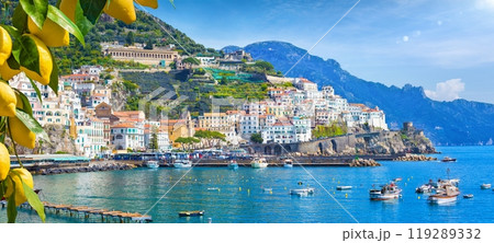 Panoramic view of beautiful Amalfi on hills leading down to coast, Campania, Italy. Amalfi coast is most popular travel and holiday destination in Europe. Panoramic view of beautiful Amalfi on hills leading down to coast, Campania, Italy. Amalfi coast is most popular travel and holiday destination in Europe. 119289332