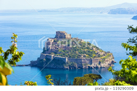 Aerial view of Aragonese Castle, most popular landmark and travel destination located in Tyrrhenian sea near Ischia island, Italy. Aerial view of Aragonese Castle, most popular landmark and travel destination located in Tyrrhenian sea near Ischia island, Italy. 119290309