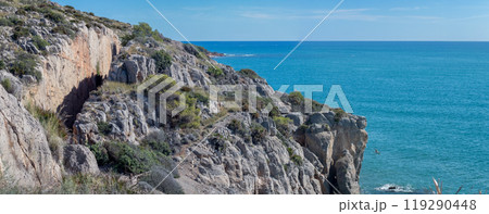 Rocky Mediterranean Coastline with Clear Blue Water 119290448