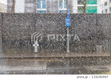 Water drops of rain on a window glass 119290997