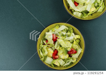 Spring salad of raw fresh vegetables. 119291254