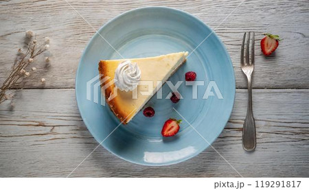 俯瞰で撮った、お皿に乗ったチーズケーキ 119291817