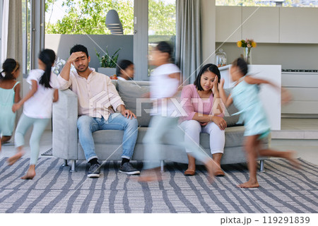 Parents, running and stress in home, kids and tired with burnout, anxiety and noise in a living room. Mother, father and energetic children in a lounge, depressed and fatigue or motion and headache Parents, running and stress in home, kids and tired with burnout, anxiety and noise in a living room. Mother, father and energetic children in a lounge, depressed and fatigue or motion and headache 119291839
