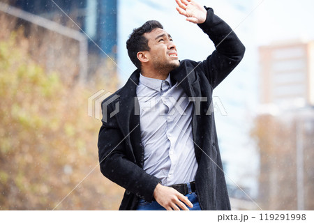 Business man, rain and stress in street with no cover, thinking and commute to job in metro city. Person, outdoor and surprise with storm on road, sidewalk and stop water drops with hand in winter 119291998
