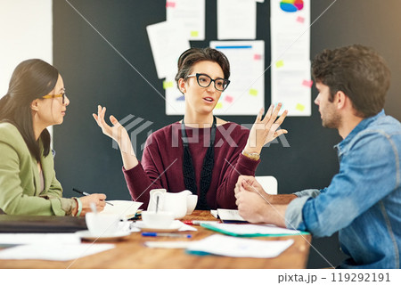 People, teamwork or writers talking in startup meeting for writing solution, conversation or discussion. Paperwork, woman and editors in office for planning, creative ideas or group collaboration 119292191