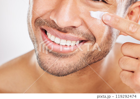 Happy man, hand or face cream closeup for beauty in studio with smile, natural cosmetics or glow for shine. Dermatology, antiaging or male model applying skincare lotion or creme on white background Happy man, hand or face cream closeup for beauty in studio with smile, natural cosmetics or glow for shine. Dermatology, antiaging or male model applying skincare lotion or creme on white background 119292474