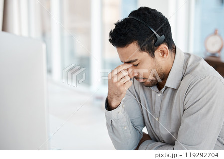 Man, call center and headache pain or telemarketing stress as overtime deadline, burnout or migraine. Asian person, headset and fatigue with brain fog or vertigo, customer support or mental health 119292704