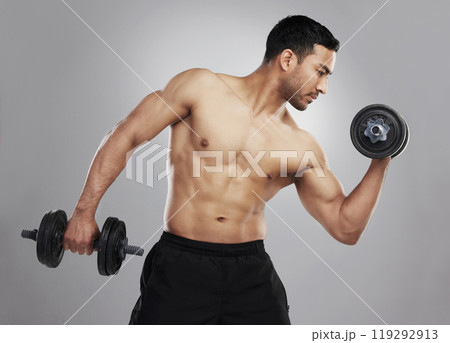 Asian man, dumbbell and weightlifting or strong training on studio grey background, biceps or athlete. Male person, bodybuilder and muscle exercise or workout confidence for sports, warm up or gym Asian man, dumbbell and weightlifting or strong training on studio grey background, biceps or athlete. Male person, bodybuilder and muscle exercise or workout confidence for sports, warm up or gym 119292913