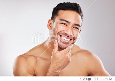 Portrait, skincare and man with cosmetics, wellness and dermatology on white studio background. Face, person and model with beauty, healthy skin and grooming routine with shine, luxury and aesthetic Portrait, skincare and man with cosmetics, wellness and dermatology on white studio background. Face, person and model with beauty, healthy skin and grooming routine with shine, luxury and aesthetic 119292918