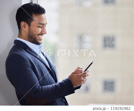 Office window, phone and happy asian businessman with social media, search or web scroll on work break. Smartphone, rain or consultant with app in China for crm deal, chat or b2b client communication Office window, phone and happy asian businessman with social media, search or web scroll on work break. Smartphone, rain or consultant with app in China for crm deal, chat or b2b client communication 119292962