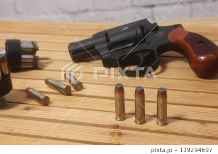 Vintage Revolver Gun With Ammunition and Speed Loader 119294697