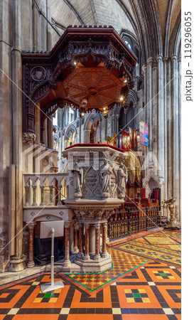 Ornate pulpit at St. Patrick's Cathedral with mosaic tiles and gothic arches in the background Ornate pulpit at St. Patrick's Cathedral with mosaic tiles and gothic arches in the background 119296055