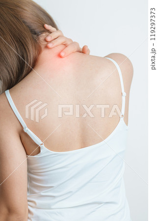 Woman having Neck and Shoulder pain at home. Muscle painful due to Myofascial pain syndrome and Fibromyalgia, rheumatism, Scapular pain, Cervical Spine. ergonomic concept Woman having Neck and Shoulder pain at home. Muscle painful due to Myofascial pain syndrome and Fibromyalgia, rheumatism, Scapular pain, Cervical Spine. ergonomic concept 119297373
