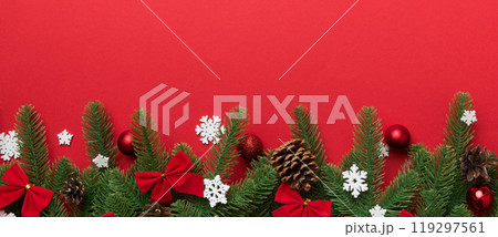 Christmas background with fir branches and Christmas decor. Top view, copy space for text 119297561
