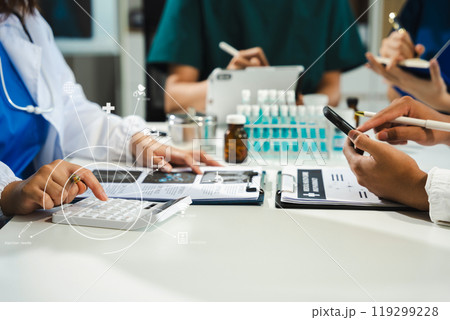 Doctors working together on digital tablet healthcare doctor technology tablet information about drug using computer in a modern office. 119299228