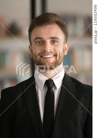 Positive young Caucasian executive, CEO, business owner man professional portrait 119302499