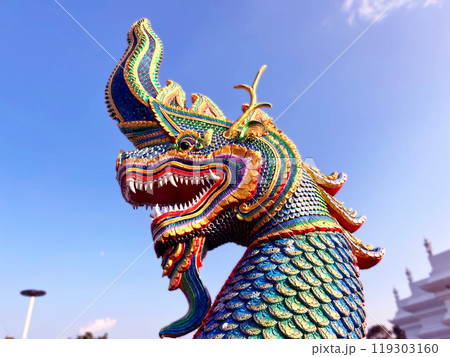 Naga King with Buddha Statue Beautiful Naga Statue, chinese dragon statue in temple, Thai dragon or serpent king statue Naga King with Buddha Statue Beautiful Naga Statue, chinese dragon statue in temple, Thai dragon or serpent king statue 119303160