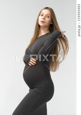 expectant female motherhood girl maternity black dress mother background pregnancy tummy positive expectant female motherhood girl maternity black dress mother background pregnancy tummy positive 119303483