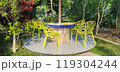 Wooden table in garden 119304244