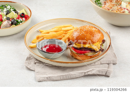 Portion of burger with french potato fries Portion of burger with french potato fries 119304266