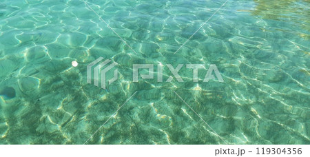 Azure Aegean sea view. Vourvourou village, Diaporos island. North Greece 119304356