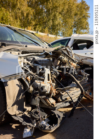 Severe Car Crash Damage Completely Wrecked Vehicles After a Major Collision Incident 119305211