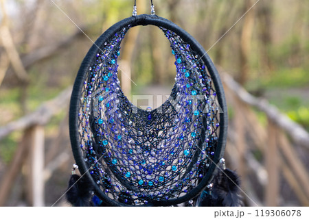 Handmade dream catcher with feathers threads and beads rope hanging Handmade dream catcher with feathers threads and beads rope hanging 119306078
