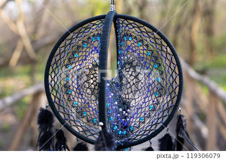 Handmade dream catcher with feathers threads and beads rope hanging Handmade dream catcher with feathers threads and beads rope hanging 119306079