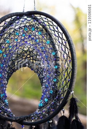 Handmade dream catcher with feathers threads and beads rope hanging Handmade dream catcher with feathers threads and beads rope hanging 119306081