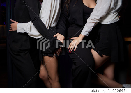 A Stylish and Modern Fashion Ensemble Featuring the Hands and Legs in an Elegant Way 119306454