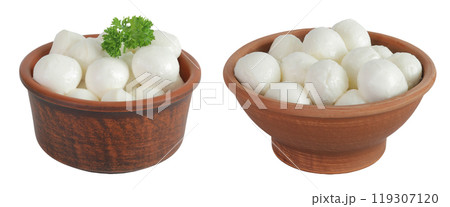 Mini mozzarella balls with parsley in a ceramic bowl isolated on white background with full depth of field. Mini mozzarella balls with parsley in a ceramic bowl isolated on white background with full depth of field. 119307120