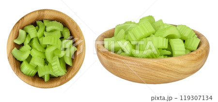 fresh celery in wooden bowl isolated on white background. Top view. Flat lay fresh celery in wooden bowl isolated on white background. Top view. Flat lay 119307134