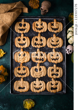 Halloween cookies in shape of jack-o-lantern 119307276